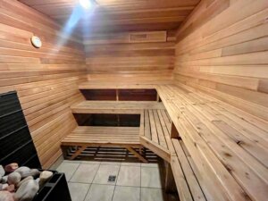 sauna with wood stove and 3 tier seating for up to 6 people comfortably